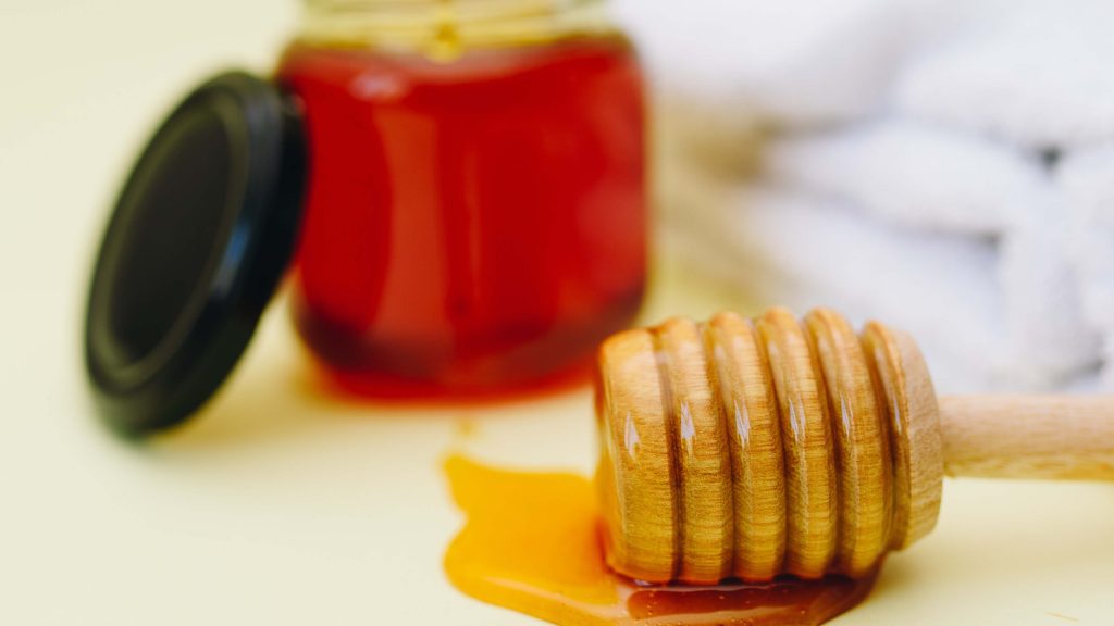 Pot, miel et bâton à miel